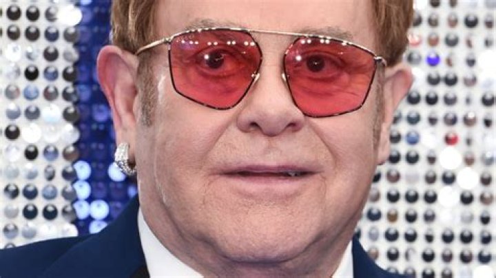 Why Does Elton John Wear Sunglasses?